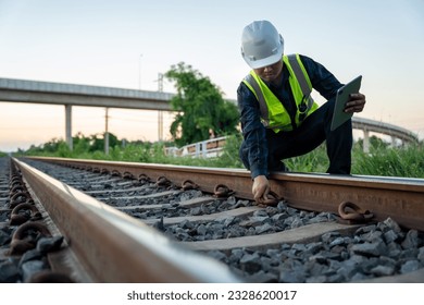 A construction worker on railways. Engineer work on railway. Infrastructure.