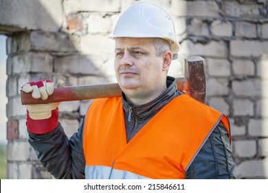 Construction Worker With Sledge Hammer 