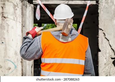 Construction Worker With Sledge Hammer