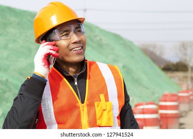 Construction Worker Talking On The Phone