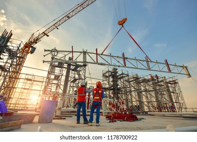 Construction worker truss installation