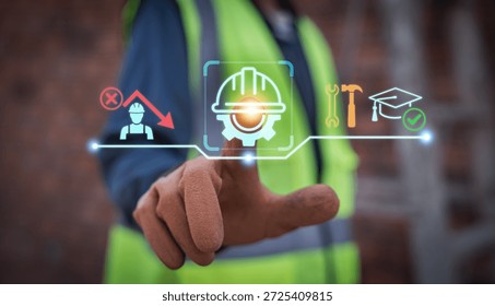 Construction worker using digital interface to solve labor shortage crisis through skilled workforce training and vocational education