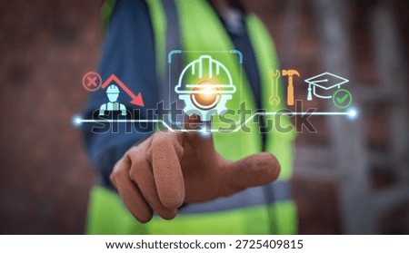 Construction worker using digital interface to solve labor shortage crisis through skilled workforce training and vocational education