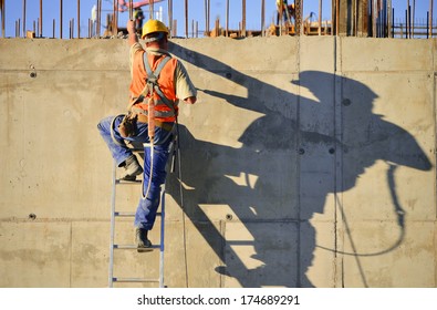 Construction worker at work - Shutterstock ID 174689291