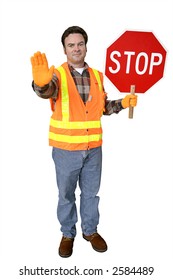 Construction Worker At A Work Site, Directing Traffic