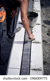 Construction worker working on a public site reconstruction.