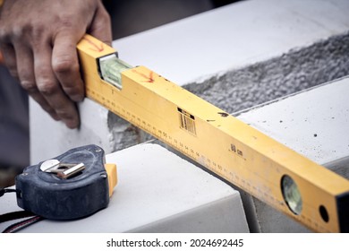 Construction Worker Working On A Street Reconstruction.