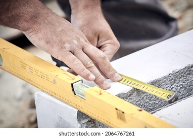 Construction Worker Working On A Street Reconstruction.