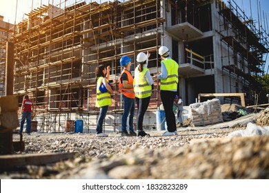 Construction workers having work meeting