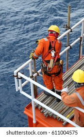 Construction Workers Installing Scaffolding On Site,Offshore Construction Platform For Production Oil And Gas, Oil And Gas Industry And Hard Work