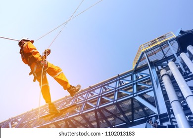 Construction Workers Operator Wearing Safety Harness Belt And Ppe During Training At High Place