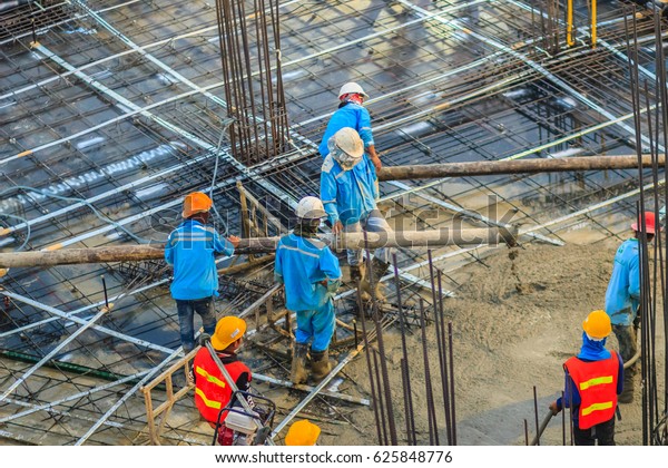 Construction Workers Pouring Concrete Posttension Flooring Stock Photo ...