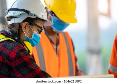 Construction Workers Wear Protective Face Masks To Prevent The Spread Of Covid 19 By Wearing A Face Mask,Corona Virus Disease. 