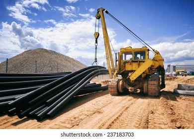 Construction works, construction machinery, bulldozer, excavation, factory
