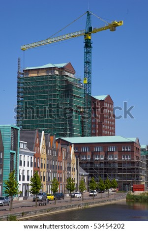 constructionsite with bulding cranes