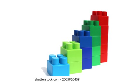 constructor of different colors built in ascending order on a white isolated background - Shutterstock ID 2005910459