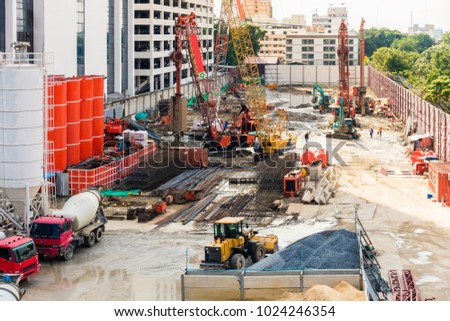 Constuction activities and operation machine at construction site.