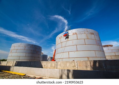 Constuction Of An Oil Derrick Crane, Big Oil Tanks