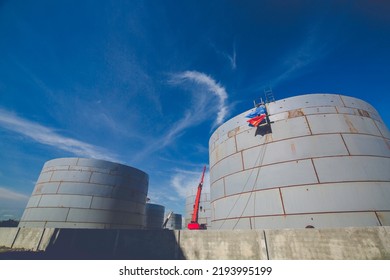 Constuction Of An Oil Derrick Crane, Big Oil Tanks