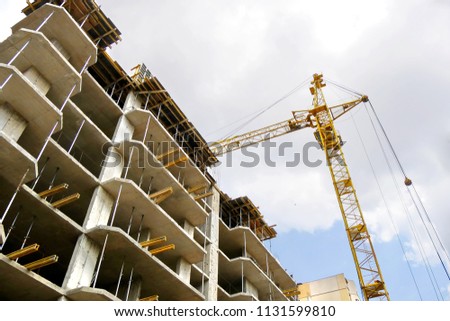 Constuction site background. Construction site with crane and building.