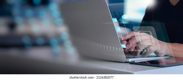  IT consultant being setup Virtual Document Management System (DMS) with laptop computer in office or wok from home.Software for archiving corporate files concept. - Powered by Shutterstock