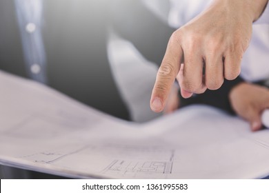 Consultant engineer discussing construction project in blueprint; Consulting concept in construction at office indoor - Shutterstock ID 1361995583