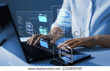 Consultant information technology (IT) working on laptop.Internet Technology ConceptAutomation software to archiving and efficiently manage and information files.Document Management System or DMS.