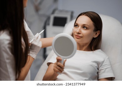 Consultation with a cosmetologist. Contour plastic. High quality photo - Powered by Shutterstock