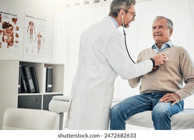 Consultation, man and doctor in checkup with stethoscope, help and advice for healthcare in office. Clinic, senior patient and medical professional at desk with support, trust and heart health on bed - Powered by Shutterstock