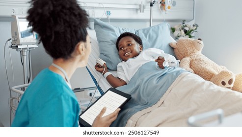 Consultation, nurse and black child patient in hospital for recovery of surgery for congenital heart disease. Tablet, sick and medical cardiology practitioner with African kid for postoperative care. - Powered by Shutterstock