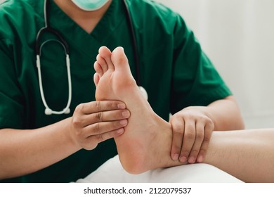 Consultation Physiotherapist With The Treatment Of Treating Injured Ankle Pain In Modern Clinics.Concept Of Physical Rehabilitation.












