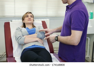 Consultation, Woman In Pain - Shutterstock ID 174168800