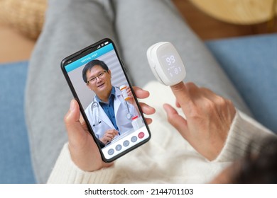 Consulting doctor visit on mobile app at home.telemedicine - Powered by Shutterstock