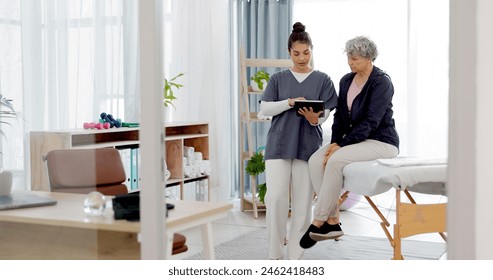 Consulting, physiotherapist and senior woman for physical therapy, healthcare service and support. Physiotherapy, chiropractor and medical worker or person talking to elderly patient in consultation - Powered by Shutterstock