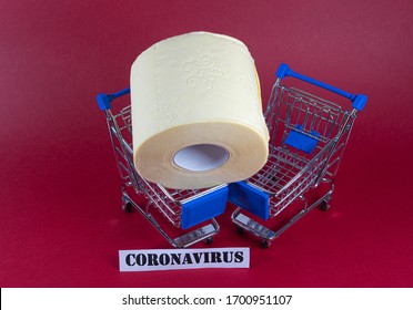 Consumer Buying Panic About Coronavirus Covid-19 Concept. Toilet Paper Roll In Shopping Trolley With Inscription Stop Panic. People Are Stocking Up Essentials For Home Quarantine