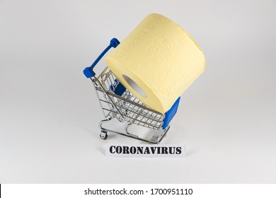 Consumer Buying Panic About Coronavirus Covid-19 Concept. Toilet Paper Roll In Shopping Trolley With Inscription Stop Panic. People Are Stocking Up Essentials For Home Quarantine