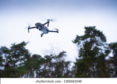 A consumer drone flying on the edge of the woods in national park 'De Loonse en Drunense duinen' near Waalwijk, Noord-Brabant, Nederland