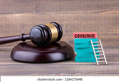 Consumer Protection, Justice And Law Concept. Colorful Wooden Blocks