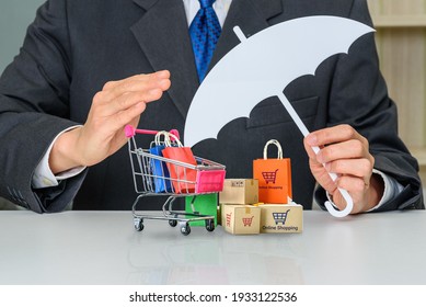 Consumer rights and consumer protection, business law concept : Buyer or purchaser protects bags and boxes of goods purchased online from internet retailer website, depicts caring on products bought - Shutterstock ID 1933122536