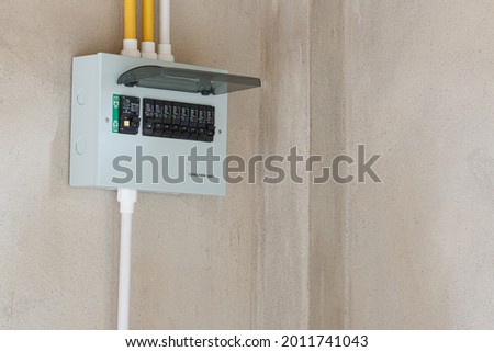 Consumer unit with automatic fuses and switchboard with circuit breakers. Electrical panel in home distribution board of AC power systems