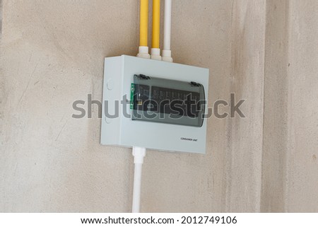 Consumer unit with automatic fuses and switchboard with circuit breakers. Electrical panel in home distribution board of AC power systems