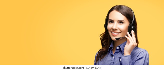 Contact Call Center Service. Customer Support, Sales Agent. Caller Or Answering Phone Operator Or Businesswoman. Looking Up Woman In Headset At Studio Image. Yellow Background With Copy Space. Zoom.