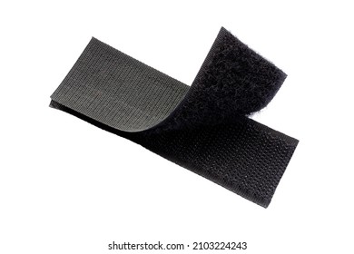 Contact tape isolated on white background, top view. Black velcro on a white background. Velcro fastener for clothes isolated on white background, top view. Black velcro, top view. - Shutterstock ID 2103224243