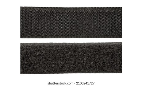 Contact tape isolated on white background, top view. Black velcro on a white background. Velcro fastener for clothes isolated on white background, top view. Black velcro, top view.