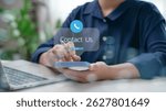 The Contact Us button on the mobile screen is for customer support interaction. customer support concept.