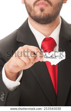 Contact us concept using an elegant man holding a piece of paper. He wears an elegant black suit and a red necktie.