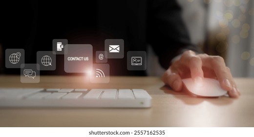 Contact us, customer service channel concept. Clicking mouse, virtual screen icons of customer contact channels and services (address, phone, email, live chat, self service, social media, video chat) - Powered by Shutterstock