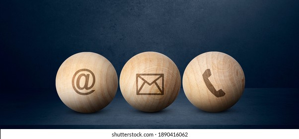 Contact us signs on wood ball spheres , symbols at, e-mail address and phone, 