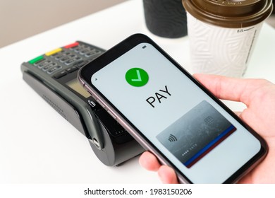 Contactless payment for coffee using application in smartphone.  - Powered by Shutterstock - Get 15% off with code: PIKWIZARD15