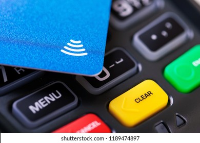 contactless payment - nfc credit card on transaction terminal